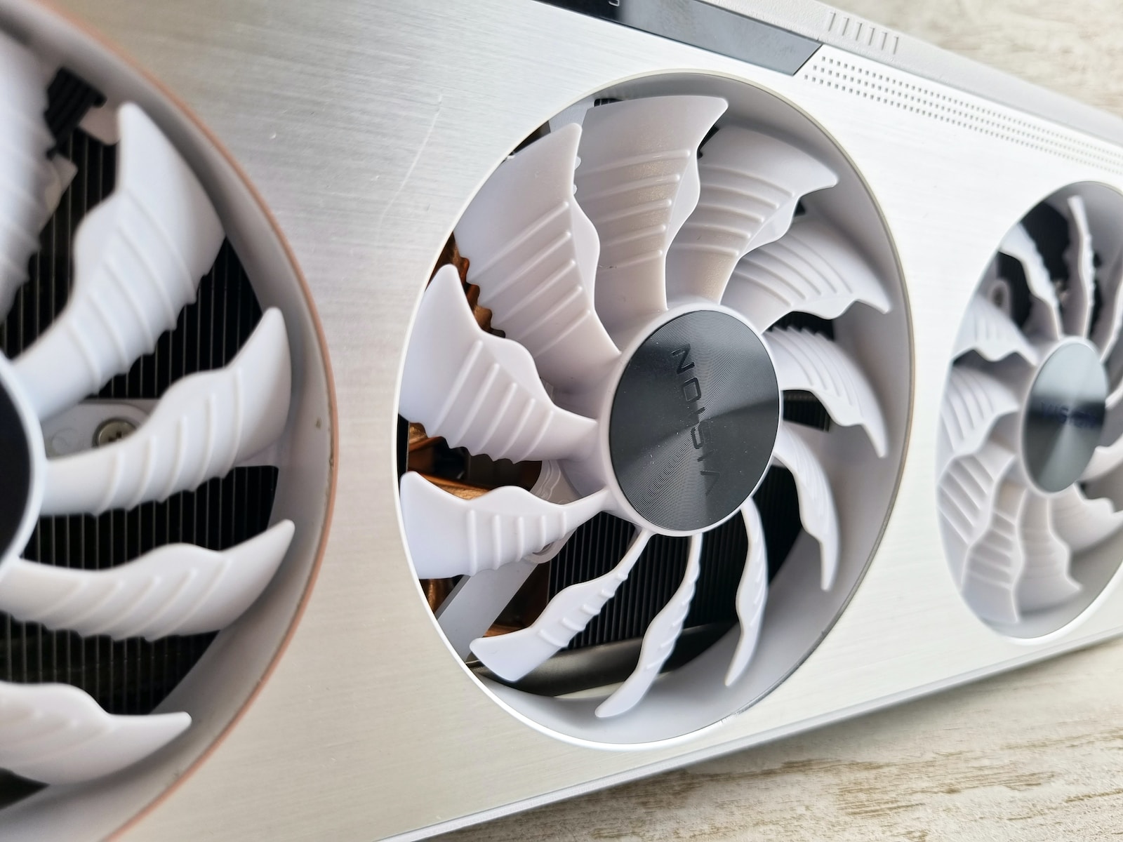 a close up of two fans on a metal surface