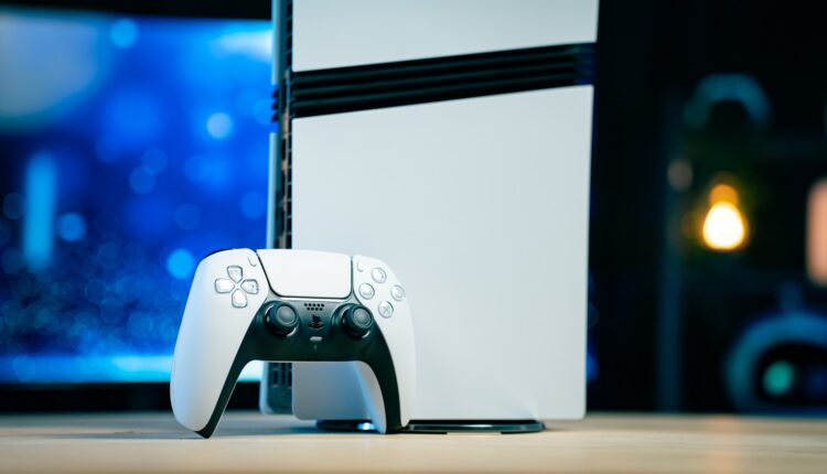 A video game console sitting on top of a wooden table